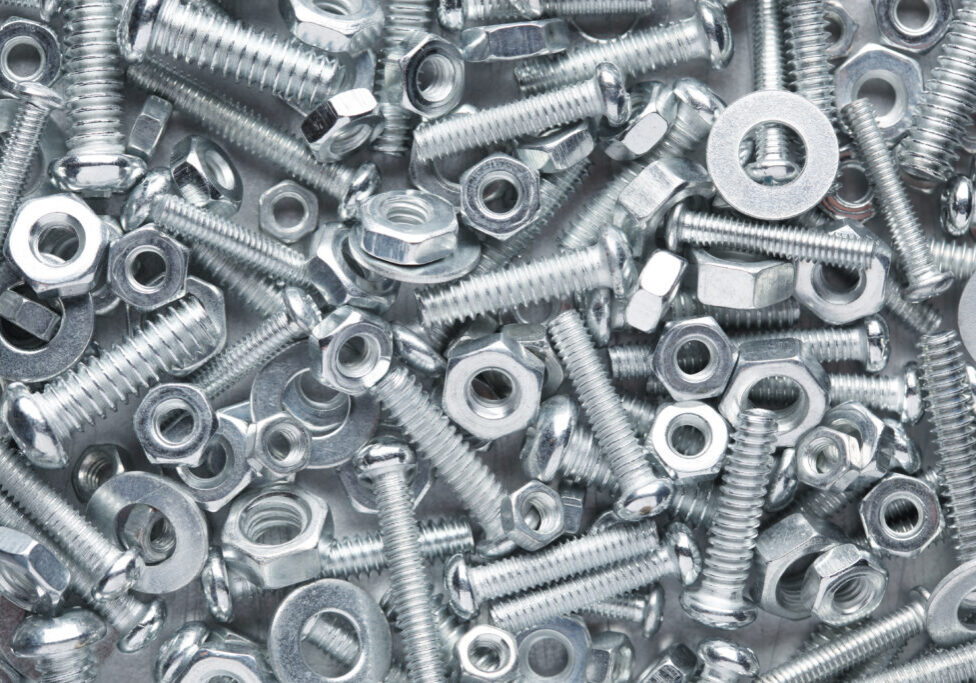 Nuts and bolts background Background photo of assorted nuts and bolts